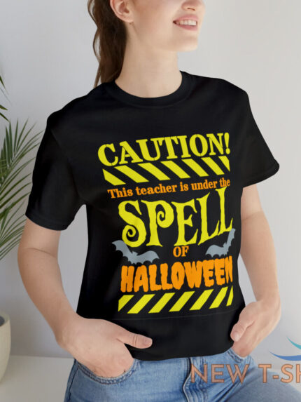 teacher under the spell of halloween halloween tshirt gift for teachers 0.jpg