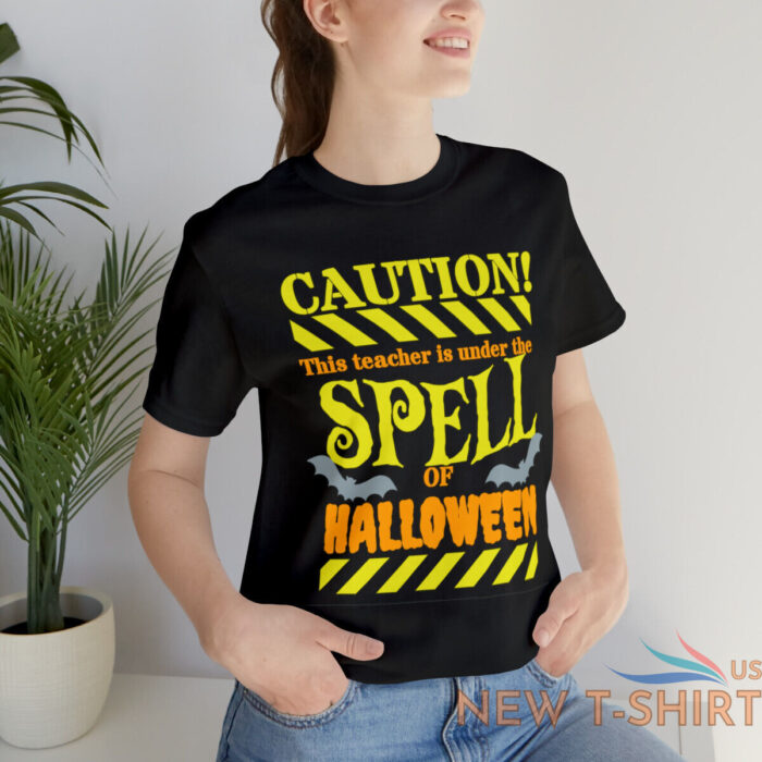 teacher under the spell of halloween halloween tshirt gift for teachers 0.jpg